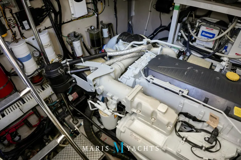 Man O War Yacht Photos Pics Engine room of 2009 Sea Ray 55 Sundancer yacht, showcasing mechanical components and systems.