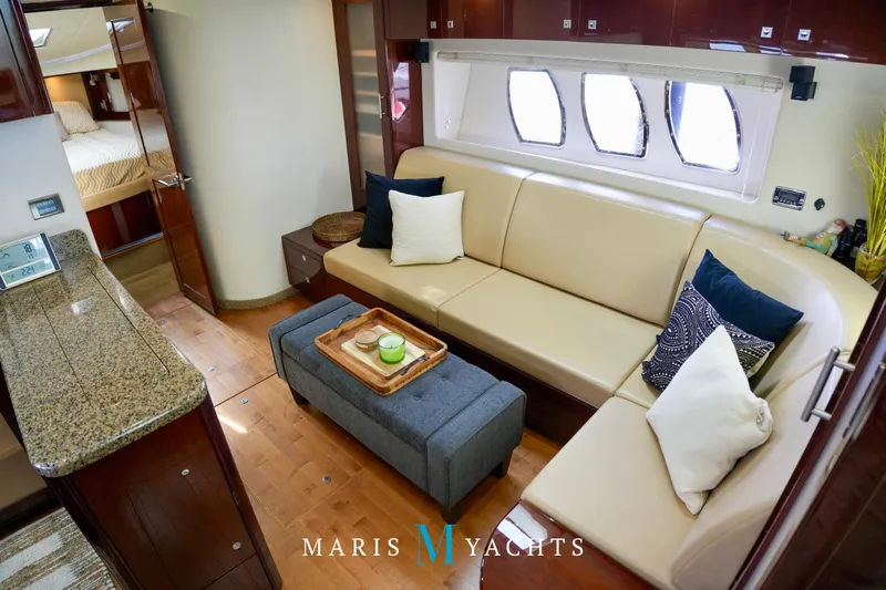 Man O War Yacht Photos Pics Luxurious interior of 2009 Sea Ray 55 Sundancer yacht with elegant seating and decor.