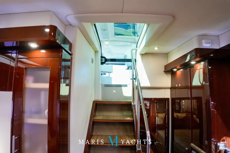 Man O War Yacht Photos Pics Luxurious interior of 2009 Sea Ray 55 Sundancer yacht with elegant wood finishes.
