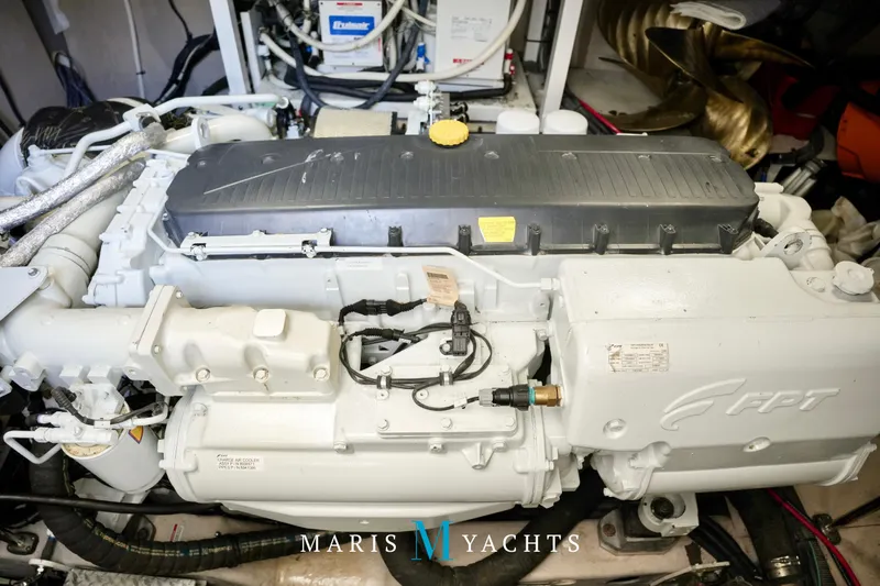 Man O War Yacht Photos Pics Engine room of 2009 Sea Ray 55 Sundancer yacht, featuring FPT engine components.