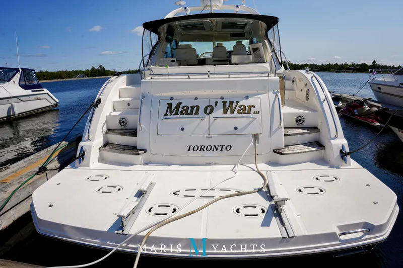 Man O War Yacht Photos Pics 2009 Sea Ray 55 Sundancer yacht docked, rear view, named "Man o' War" in Toronto.