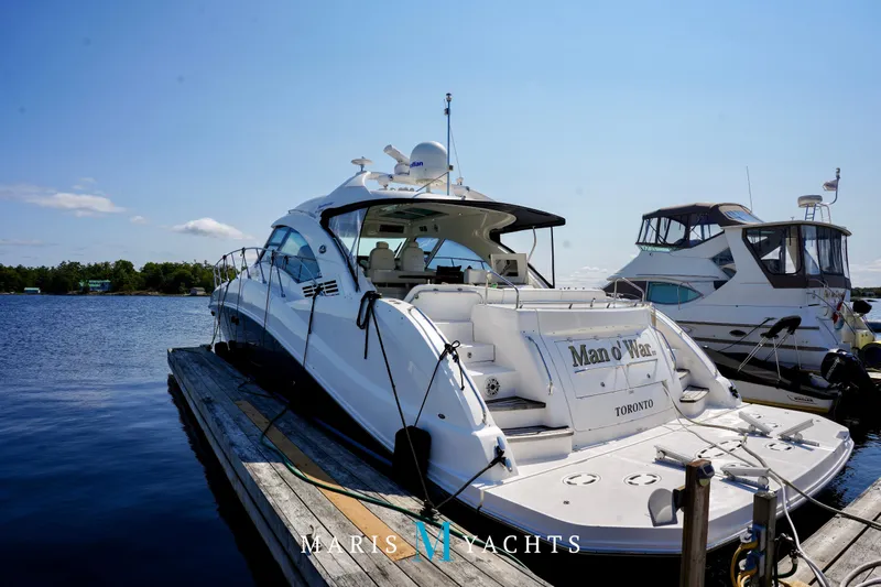 Man O War Yacht Photos Pics 2009 Sea Ray 55 Sundancer yacht docked, sunny day, Toronto marina.