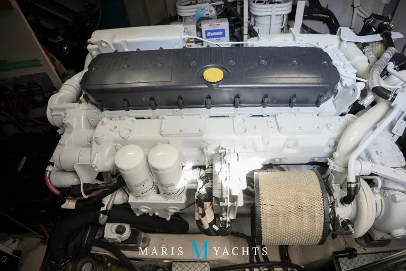 Man O War Yacht Photos Pics Engine room of 2009 Sea Ray 55 Sundancer yacht, showcasing detailed machinery components.