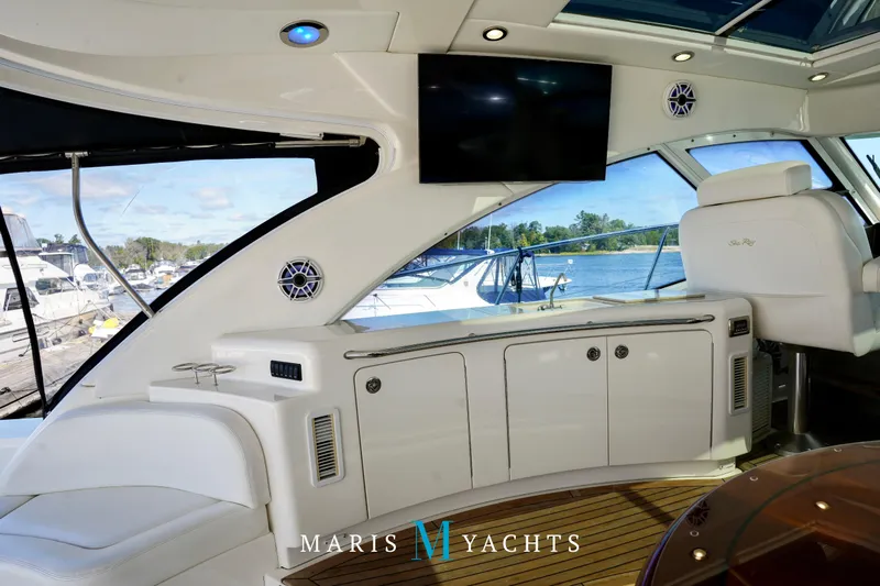 Man O War Yacht Photos Pics Luxurious interior of 2009 Sea Ray 55 Sundancer yacht with elegant seating and scenic views.