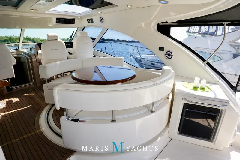 Man O War Yacht Photos Pics Luxurious interior of 2009 Sea Ray 55 Sundancer yacht with elegant seating and scenic views.