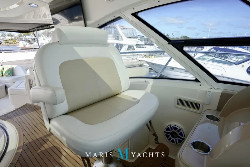 Man O War Yacht Photos Pics Luxurious interior of 2009 Sea Ray 55 Sundancer yacht with plush seating and elegant design.