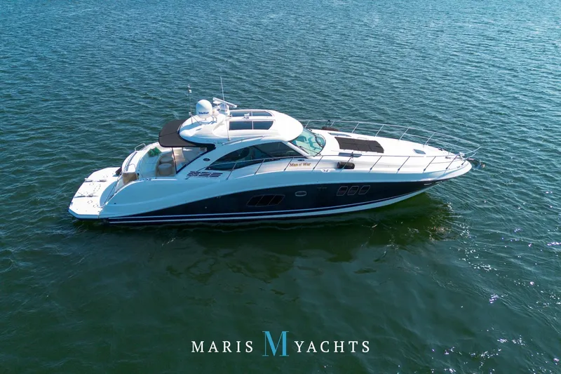 Man O War Yacht Photos Pics 2009 Sea Ray 55 Sundancer yacht cruising on open water.