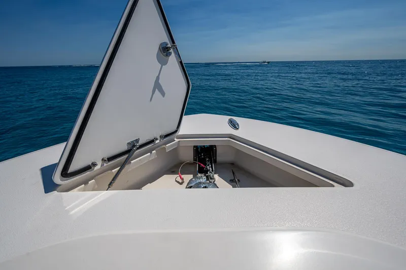  Yacht Photos Pics Front Runner 39 boat anchor compartment open on calm ocean, 2020 model.