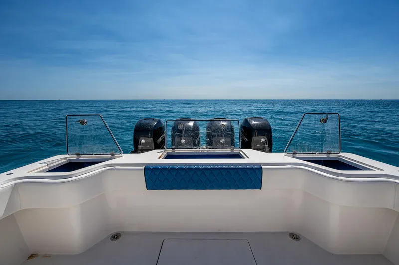  Yacht Photos Pics 2020 Front Runner 39 boat with four engines, ocean view, clear sky.