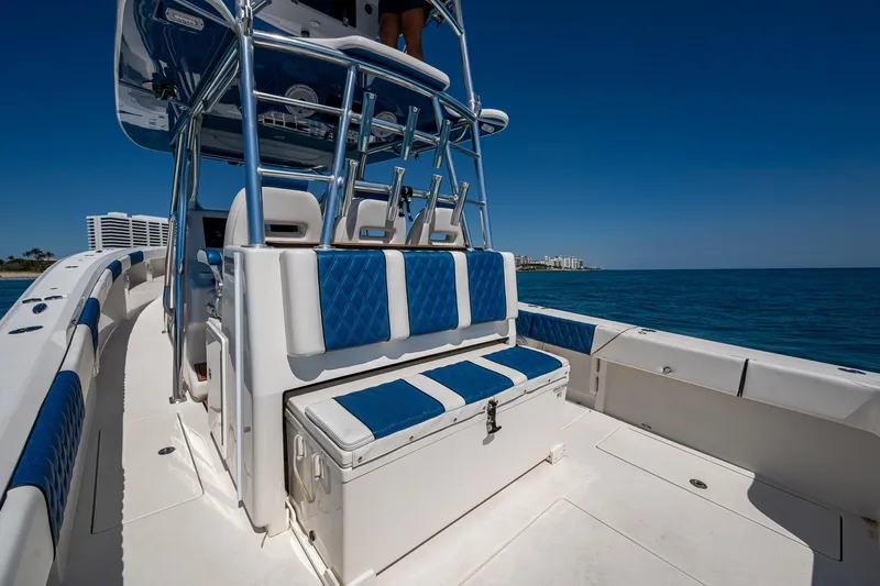  Yacht Photos Pics 2020 Front Runner 39 boat with blue and white seating, ocean view.