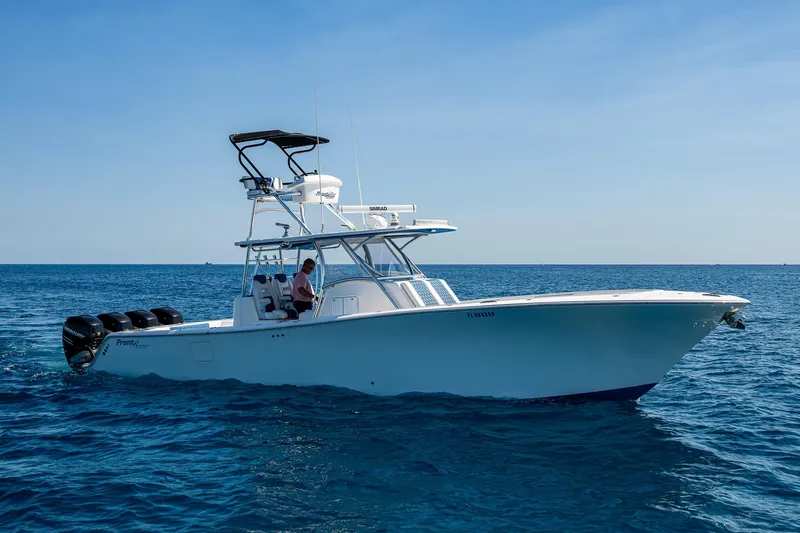  Yacht Photos Pics 2020 Front Runner 39 boat cruising on open blue sea.