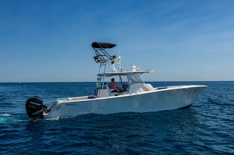  Yacht Photos Pics Front Runner 39 boat cruising on open sea, 2020 model, clear blue sky.