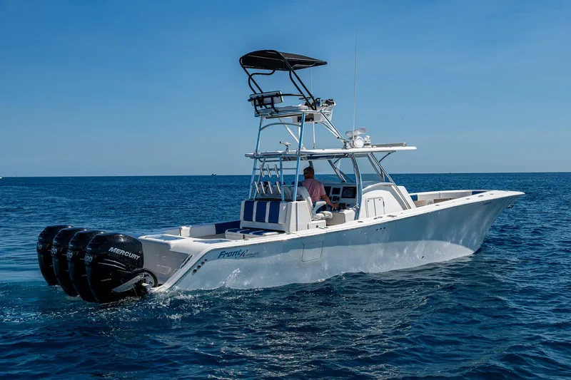  Yacht Photos Pics 2020 Front Runner 39 boat on open sea with multiple outboard engines.