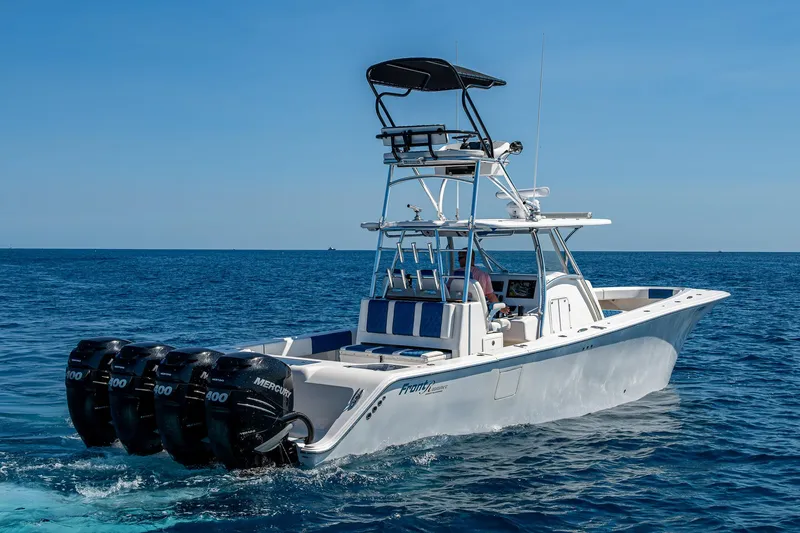  Yacht Photos Pics 2020 Front Runner 39 boat with four engines cruising on open sea.