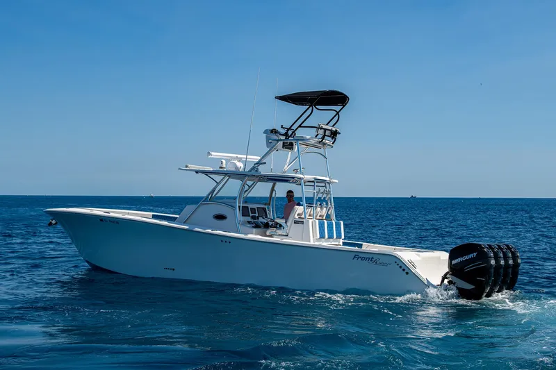  Yacht Photos Pics 2020 Front Runner 39 boat cruising on open sea with clear blue sky.