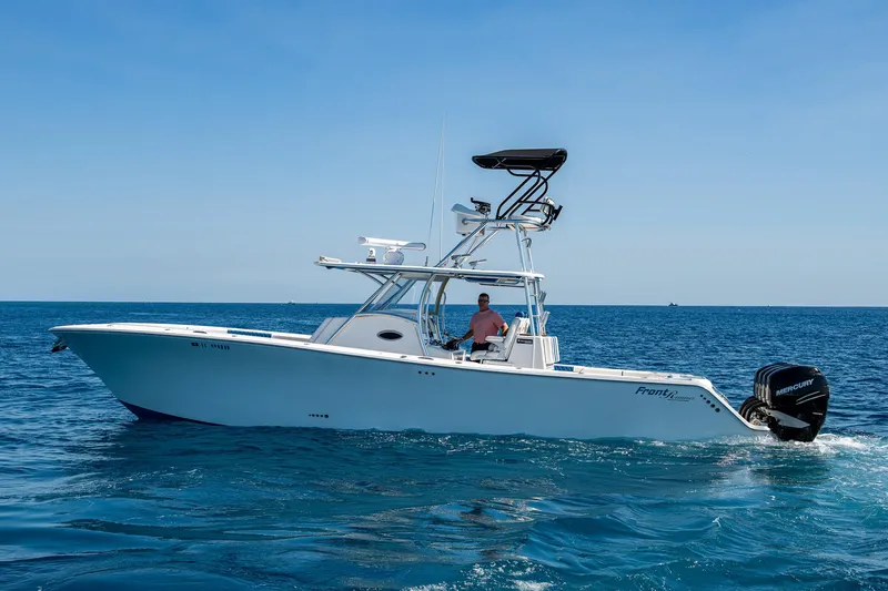 Yacht Photos Pics 2020 Front Runner 39 boat cruising on open water under clear blue sky.