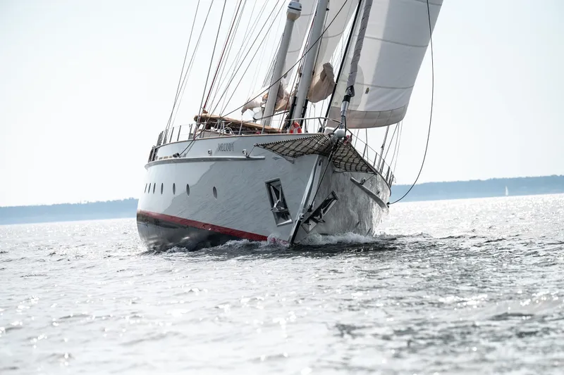 Melody Yacht Photos Pics Custom Ridas Yacht 2022 sailing on open water, showcasing elegant design and craftsmanship.