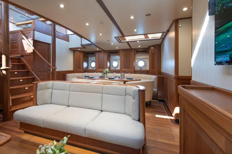 Melody Yacht Photos Pics Luxurious interior of 2022 Ridas Custom Yacht with elegant wood finishes and modern furnishings.