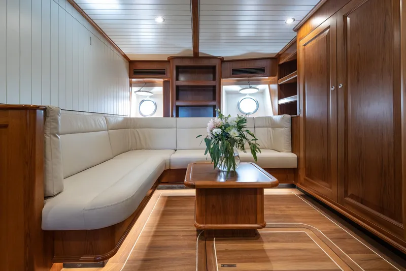 Melody Yacht Photos Pics Luxurious 2022 Ridas Custom Yacht interior with elegant wood finish and plush seating.