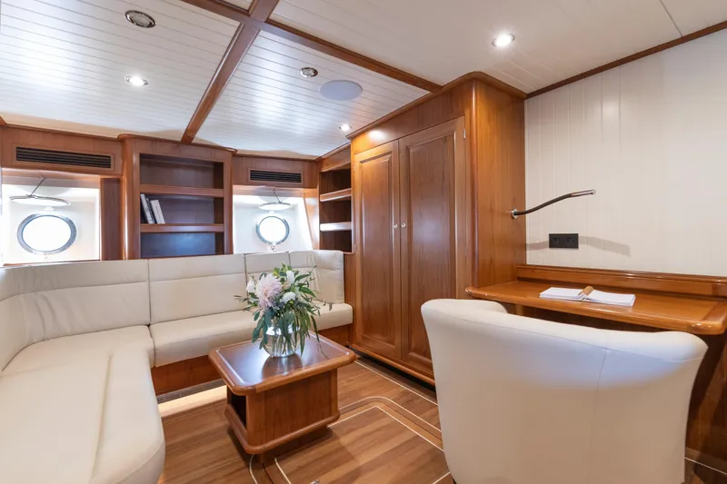 Melody Yacht Photos Pics Luxurious 2022 Ridas Custom Yacht interior with elegant wood finishes and plush seating.