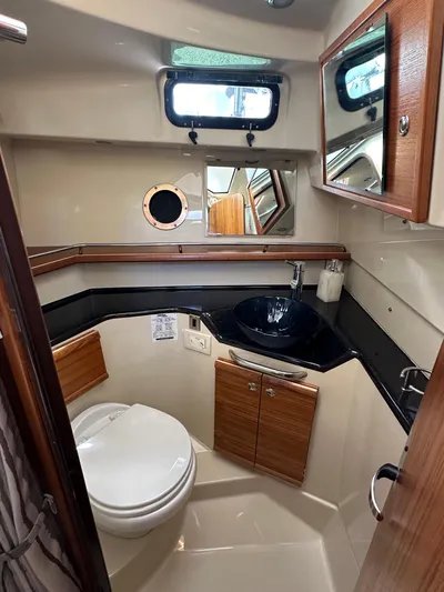  Yacht Photos Pics Interior view of a 2023 Ranger Tugs R-29 S yacht bathroom.