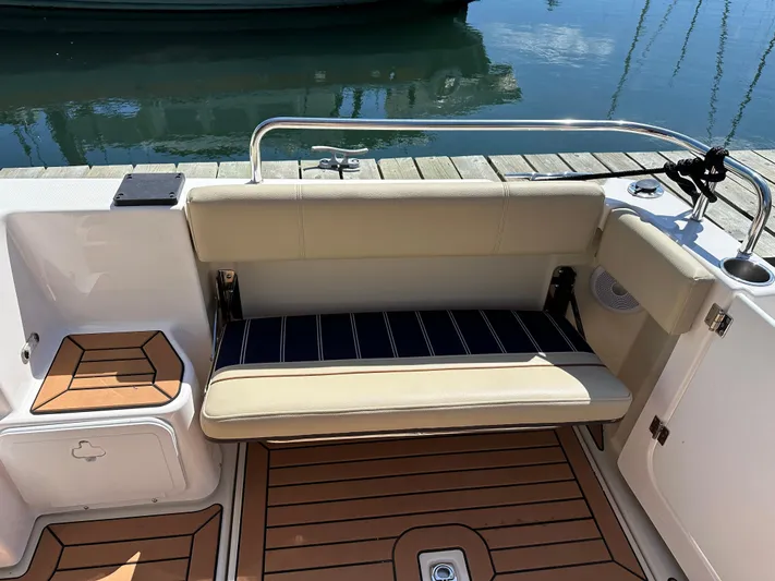  Yacht Photos Pics Ranger Tugs R-29 S 2023 seating area with wood deck.