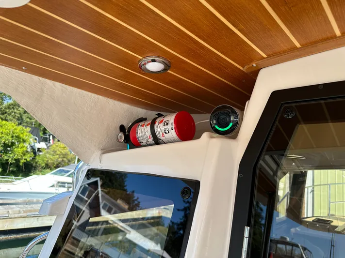  Yacht Photos Pics Interior view of 2023 Ranger Tugs R-29 S with fire extinguisher.