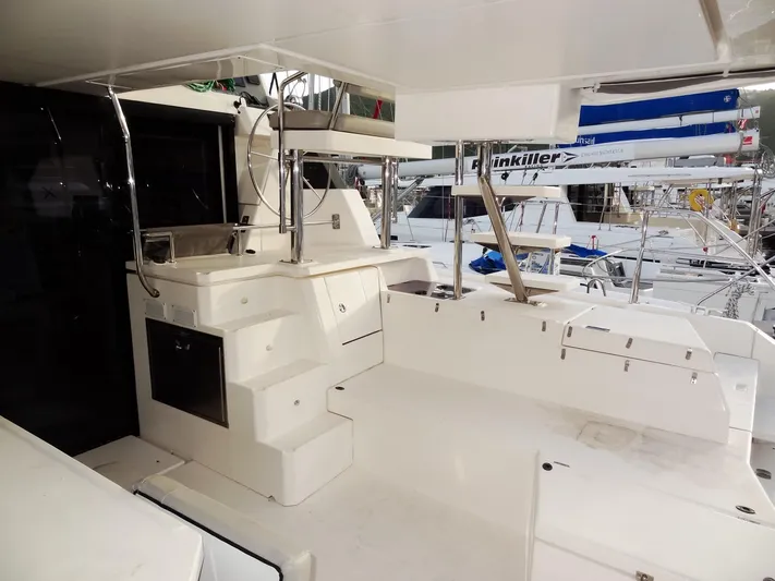 Aquaholic Yacht Photos Pics 2019 Leopard 50 yacht interior with white seating and steps.