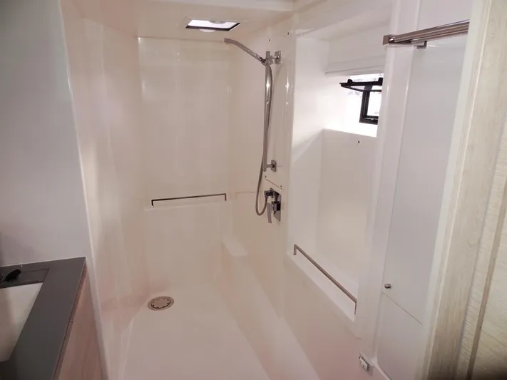 Aquaholic Yacht Photos Pics Modern shower area in 2019 Leopard 50 yacht with sleek fixtures and natural light.