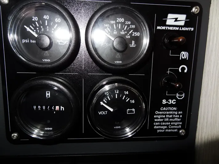 Aquaholic Yacht Photos Pics Leopard 50 2019 engine control panel with gauges and Northern Lights S-3C warning.