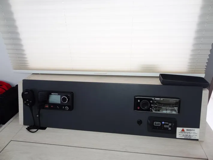 Aquaholic Yacht Photos Pics Control panel of a 2019 Leopard 50 yacht with communication and navigation equipment.