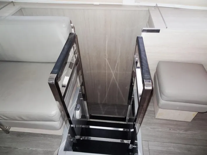Aquaholic Yacht Photos Pics Staircase on a 2019 Leopard 50 yacht with modern interior design.