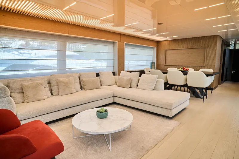 Yacht Photos Pics Luxurious interior of 2023 Ferretti Yachts 920 with modern seating and dining area.