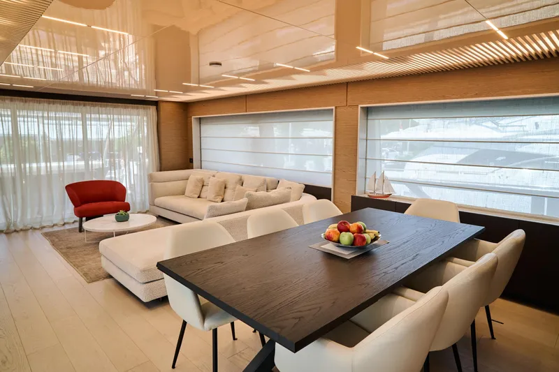  Yacht Photos Pics Luxurious interior of 2023 Ferretti Yachts 920 with modern dining and living area.