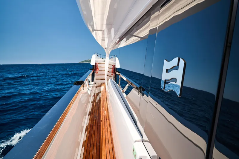  Yacht Photos Pics 2023 Ferretti Yachts 920 cruising on open sea, showcasing sleek design and luxury.