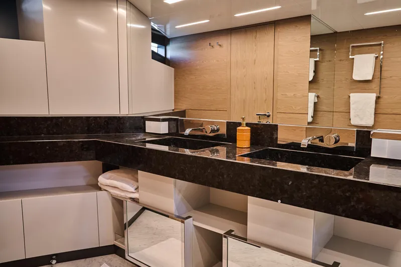  Yacht Photos Pics Luxurious bathroom in 2023 Ferretti Yachts 920, featuring modern fixtures and elegant design.