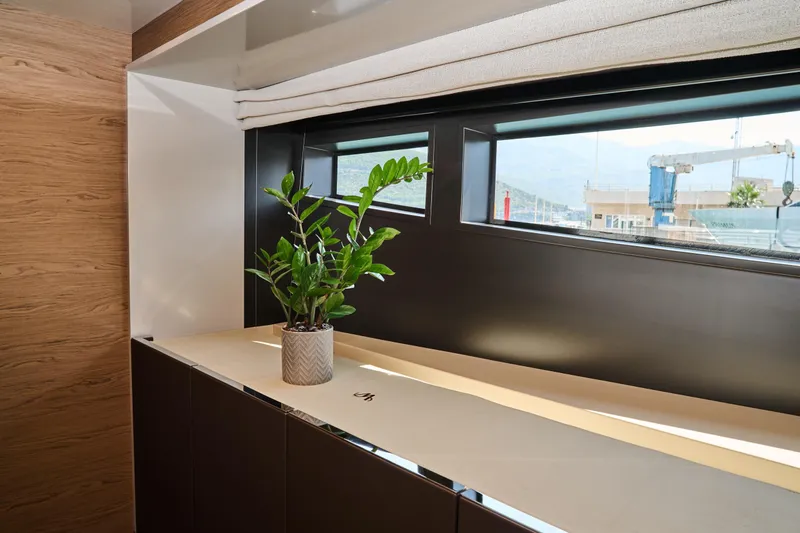  Yacht Photos Pics Interior of 2023 Ferretti Yachts 920 with plant and window view.
