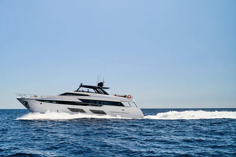  Yacht Photos Pics 2023 Ferretti Yachts 920 cruising on open sea under clear blue sky.