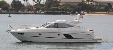 Be Water My Friend Yacht Photos Pics 2016 Beneteau GT49 yacht cruising on calm waters, side view.