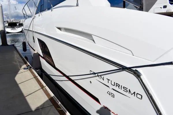 Be Water My Friend Yacht Photos Pics 2016 Beneteau GT49 yacht docked at marina, sleek white exterior design.