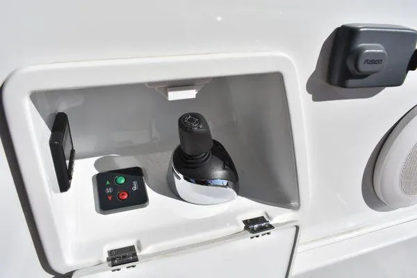 Be Water My Friend Yacht Photos Pics Control panel of a 2016 Beneteau GT49 yacht, featuring joystick and buttons.