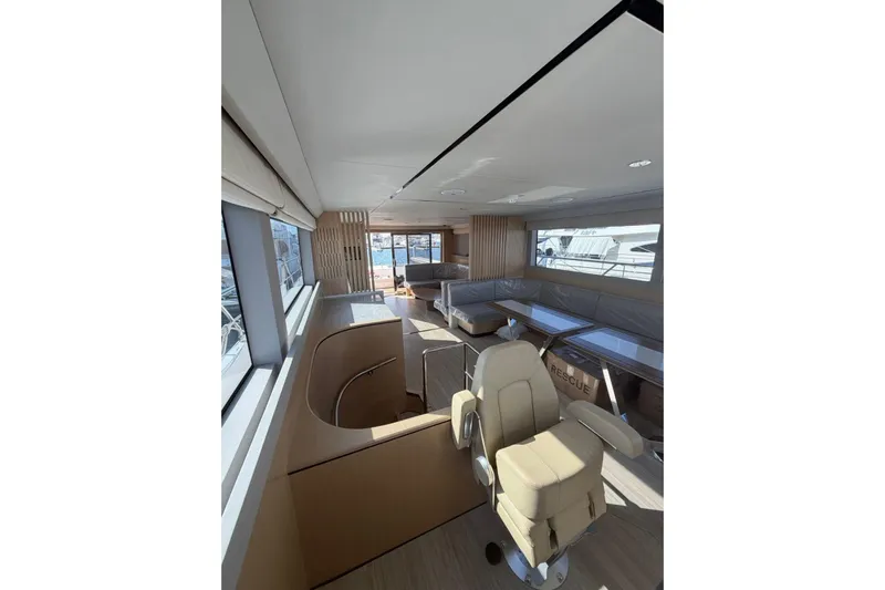  Yacht Photos Pics Luxurious interior of 2025 Haiquan 62 yacht with modern seating and panoramic windows.