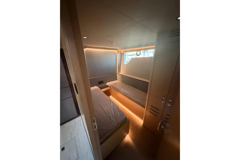  Yacht Photos Pics Luxurious cabin interior of 2025 Haiquan 62 yacht with modern lighting and twin beds.
