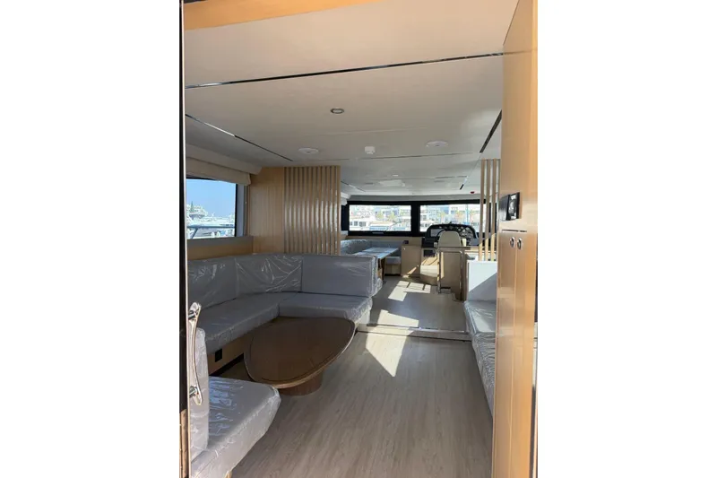  Yacht Photos Pics Luxurious interior of 2025 Haiquan 62 yacht with modern seating and panoramic windows.