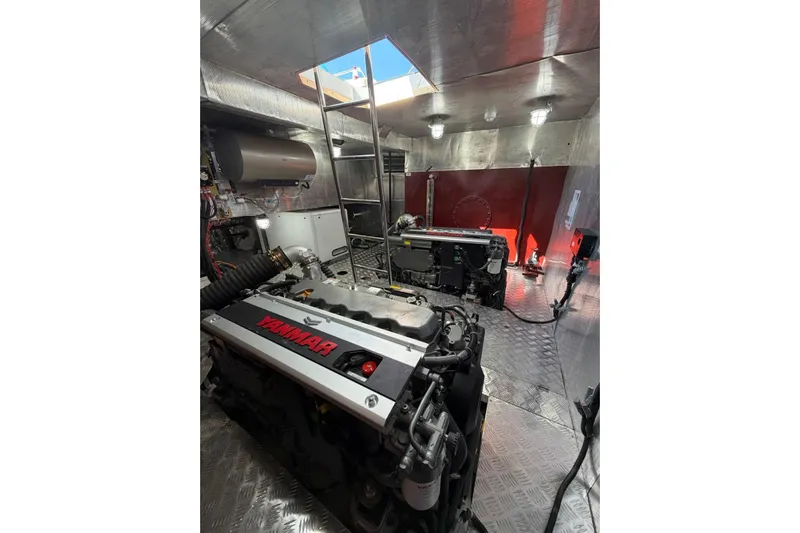  Yacht Photos Pics Engine room of 2025 Haiquan 62 yacht with Yanmar engines and metallic interior.