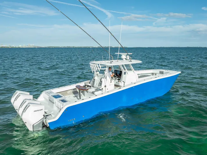  Yacht Photos Pics 2021 Freeman 37 boat on open water with dual Mercury engines.