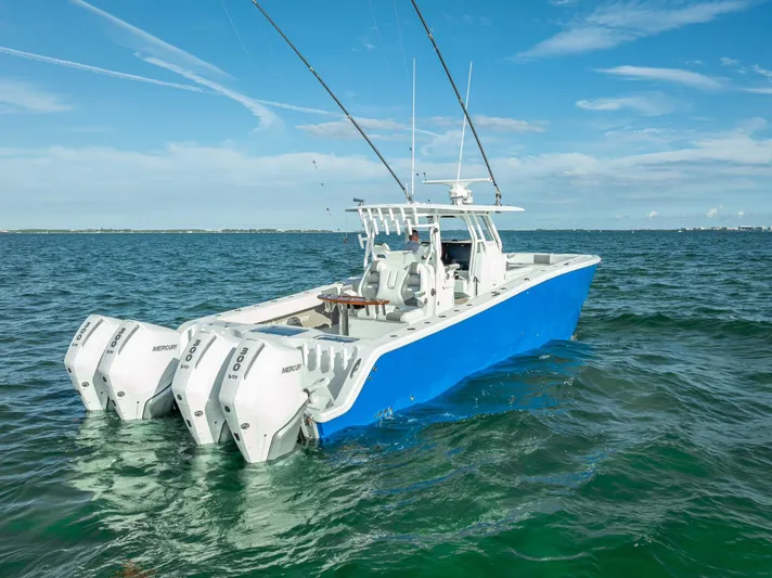  Yacht Photos Pics Freeman 37 boat, 2021 model, with triple engines on open water.