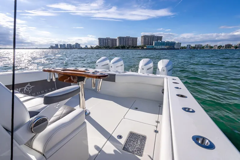  Yacht Photos Pics Freeman 37 boat, 2021 model, on water with city skyline in background.