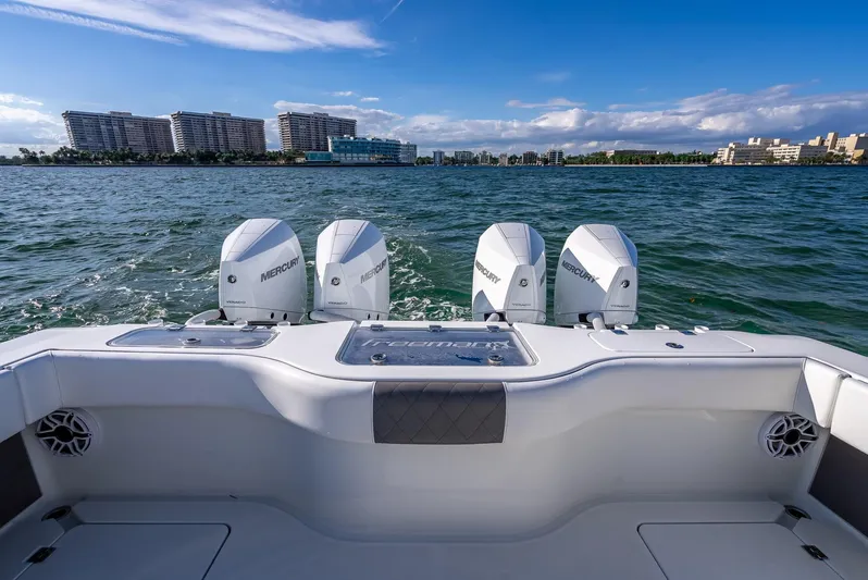  Yacht Photos Pics Freeman 37 boat with four Mercury engines on a sunny day, 2021 model.