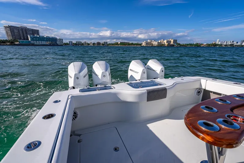  Yacht Photos Pics Freeman 37 boat, 2021 model, with quad engines on a sunny day at sea.